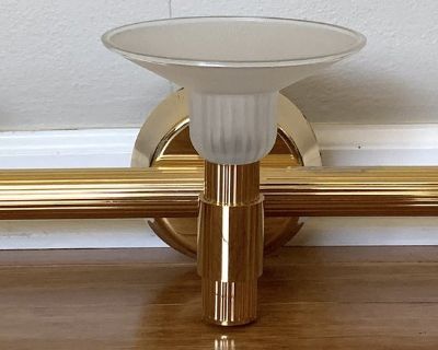 Brass Bathroom Vanity Wall Mount Fixture - NOS (purchased but never installed) - 3ft long ribbed brass cross bar - Frosted glass shades that each measure 6 across x 3 H - 3 Light - 2 pin halogen bulbs (50W each) that are approx 1.5 H with 2 H metal & glass bulb covers (see photo) *Purchased from Villa Park Electrical Supply - meant to install - never got to it before house was sold **Imperfecti...