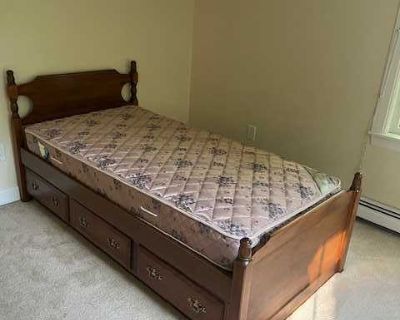 Twin Bed with mattress. Drawers underneath