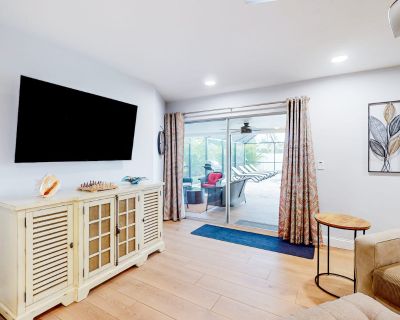 Avg / night: $373. Chic pool home w/ designer, heated, saltwater pool,attached spa, covered patio | Located in Cape Coral, FL | 5.0 Stars | 4 Bed, 2 Bath | No Pets. No pets. Max 6 guests. There is nothing like a tranquil getaway to Cape Coral to truly disconnect from daily life and forget about everything else. Just 2 miles from downtown Cape Coral's fantastic restaurants and shops, 3 miles fro...