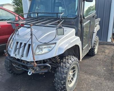 Arctic cat Prowler 700 side by side with plow and heated cab