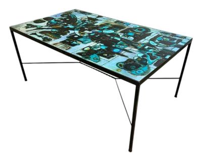 Exceptional one of a kind Ceramic Art Tile top dining table, signed and dated 1974 (signature illegible). Hand made studio pottery ceramic tiles in an abstract Mid Century/Brutalist design reminiscent of West German, Scandinavian and Italian ceramics of the era. Rich shades of blue, aqua, green, and brown with accents of red, yellow, tan and white. Tiles applied to a thick plywood base and inse...