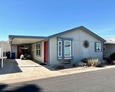 8865 E Baseline Rd #1127. Experience Refined Resort Living in this beautiful MH with 2 Bd, 2 Ba showcasing a spacious open layout between the living and dining room. The corner kitchen features an island with plenty of room fo .... 2 Bedroom. 2 Bathroom. 960 ft