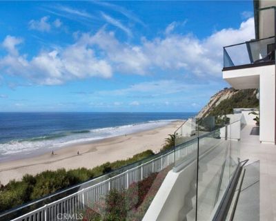 22 Breakers Isle. Stunning Design and Spectacular Whitewater Coastal Ocean Views describe this beautiful and recently remodeled oceanfront custom home perched on a premium lot in the community of Niguel Shores located next to the Ritz Carlton Hotel. Offered for lease (furnished), homes on this street are rarely available. Most all rooms capture the breathtaking ocean, Catalina Island and coastl...