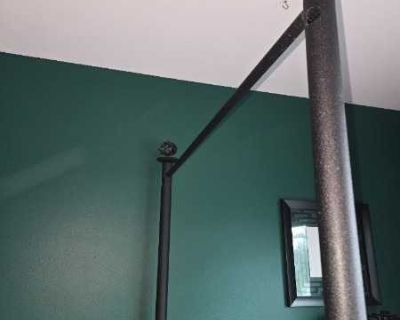 Black metal twin post bed