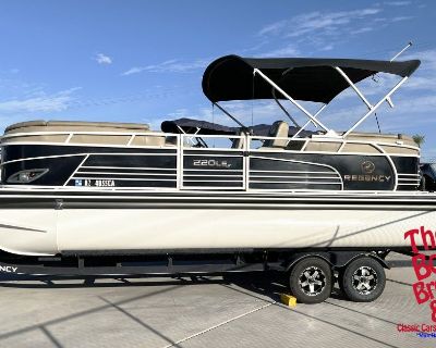 Cruise Lake Havasu in style with this 25' Regency 220LE3 Pontoon by Tracker Marine. Perfect for cruising, fishing, or entertaining comes packed with features.  Powered by a reliable Mercury outboard motor, featuring a dual Bimini top, Kenwood stereo, GPS navigation, interior lights, and plenty of storage. Comes with a boat cover and rides on a tandem axle trailer. Perfect for lake adventures, f...