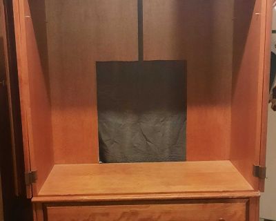 Entertainment center, also used as an armoire
