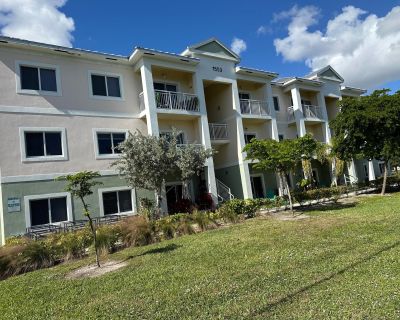 S Florida Mango Road. Beautiful 2 Bedroom, 2 Bathroom Apartment - Water Included!This stunning unit features an open kitchen with granite countertops, custom cabinetry, and Energy Star appliances, including a microwave and full-size washer and dryer in each unit. Enjoy modern flooring throughout, stylish faux wood blinds, and a bright, spacious layout.Located minutes from shopping, beaches, res...