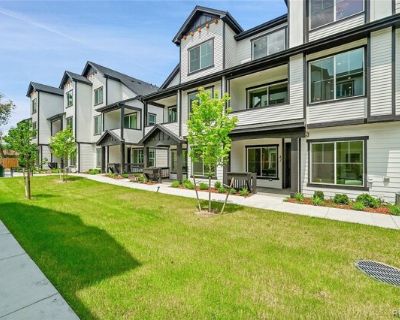 8530 W 52nd Ave Unit E3. Welcome to your new home, a newly built townhome in Hidden Acres. Featuring high ceilings, stainless steel appliances, and thoughtful finishes throughout, this 4-bedroom home has everything you could want. The attached 2-car garage has an EV charger, and the high speed internet available makes work-from-home a breeze. The first floor welcomes you with the first of two l...