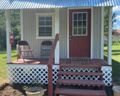 8992A Greenwood Dr. THIS CUTE TINY HOME IS IN THE COUNTRY! ALL BILLS PAID! THIS ADORABLE HOME IS 1 BEDROOM, 1 BATH WITH A FULL SIZE TILED SHOWER.THE KITCHEN IS OPEN TO THE LIVING AREA WITH APPLIANCES AND A REFRIGERATOR! THERE IS A MINI SPLIT AIR CONDITIONING THAT IS IN THE LIVING ROOM! THE TINY HOME SITS CLOSE TO A LITTLE POND ON THE 5 ACRES A LONG WITH A COUPLE OTHER HOMES. YARD MAINTENANCE IN...