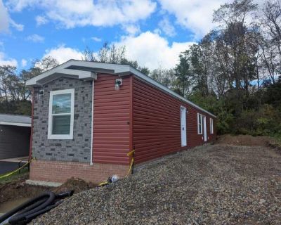 141 Hawthorne Court. This home JUST ARRIVED! Be the first to call this bright and beautiful red manufactured home yours! Featuring two spacious bedrooms and bathrooms, this home offers modern comfort and style throughout. .... 2 Bedroom. 2 Bathroom. 952 ft