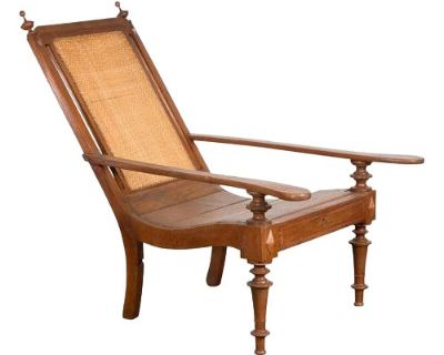 Dutch Colonial Wood and Rattan Lounge Chair with Slanted Back and Carved Finials