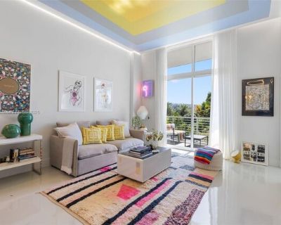 2001 Meridian Ave Apt 418. Stunning 1-bedroom, 1.5-bath loft at The Meridian, completely renovated from top to bottom. This modern residence features 11.5-foot ceilings, all-new designer finishes, and a bright south-facing layout with two balconies overlooking the Miami Beach Botanical Gardens. The kitchen and bathrooms were fully redesigned with high-end materials and fixtures, creating a poli...