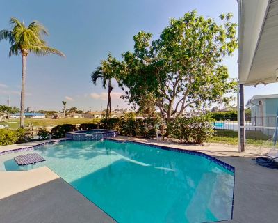4 Bedroom 3BA Pet-Friendly House Vacation Rental in Life on the Canal, Cape Coral, FL