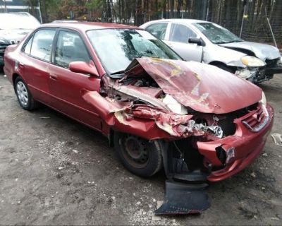 Salvage Red 2001 Toyota Corolla