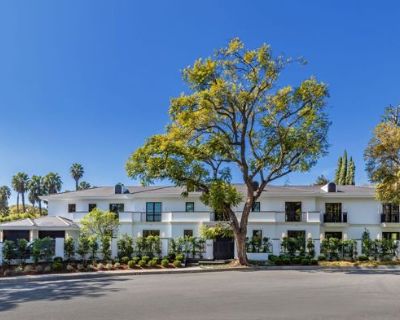 Whittier Drive. Nestled in one of Beverly Hills' most prestigious enclaves, on just over half an acre, this breathtaking modern estate seamlessly blends timeless elegance with contemporary luxury. The striking white facade, framed by lush greenery and mature trees, sets the stage for an exceptional living experience. Designed by Tim Campbell for both grand entertaining and intimate gatherings, ...