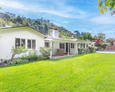 1117 Roscomare Rd. Welcome to 1117 Roscomare Road, an updated 4 bed, 3 bath home in prime lower Bel Air. This exquisite residence boasts expansive windows that flood the space with natural light, creating an ideal setting for seamless indoor/outdoor entertaining. Indulge in the allure of stunning hardwood floors, a cozy fireplace, and a gourmet kitchen with new appliances. The single-story layo...