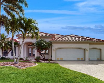 Avg / night: $518. Waterfront Oasis W/ Private Pool, Dock, Fast WiFi & Ideal Location - Dogs OK | Located in Port Charlotte, FL | 4.67 Stars | 4 Bed, 3 Bath | Pet-friendly. Dog-friendly. Max 8 guests. Experience classic Port Charlotte charm in this stunning getaway today and make the most of indoor/outdoor living right on the water. With white tiling throughout, an airy layout filled with natur...