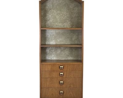 Walnut Mid Century Arch Top Bookshelf Or Display Case. Featuring Adjustable Shelving, 2 Tone Metal Accent Back Panel & 4 Drawers Below. This Unique Piece Is Ready To Turn Heads In Your Home. *I Have A Trio Of these Available, All Listed Individually*. Dimensions 30.5 W 16 D 78 H Styles Mid-Century Modern Brand Founders Furniture Company Designer Jack Cartwright Period 1960s Country of Origin Un...