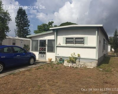 5832 Portsmouth Dr.. You are looking at a home with direct water access, the ability park your boat in your backyard and and watch dolphins drive mullet during the 10 minute ride to the bay! This home is perfect for that out of town-er that is looking to leave everything behind except personal items and move right in to a livable space. Only minutes from shopping centers, supermarkets, restaura...
