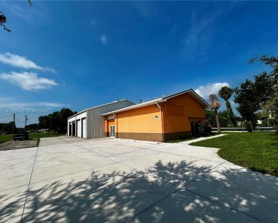 SW Park St. Prime corner location on busy Highway 70 in the heart of Downtown Okeechobee. Zoned Heavy Commercial. Includes reception area, office, warehouse with 5 roll-up doors, and space for showroom. Perfect for tire sales, repairs, auto accessories, or similar use. High traffic visibility and excellent exposure.\r\nLease price is $5,000/month for the main property only. Optional rear lot av...