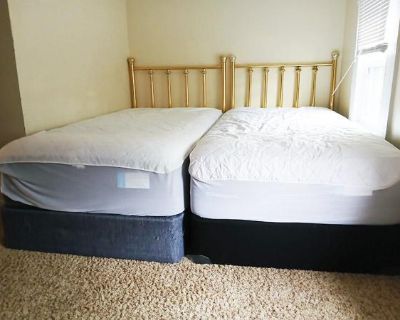 Indoor one-day garage sale, mostly furniture