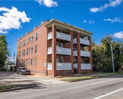 417 W 27th St Apt D. Move in Ready! This is a third floor unit with New Paint, New Carpet, New LVP Floor, New Fixtures, Updated appliances, and Washer/Dryer in the unit! Open Living Room-Kitchen with 3 bedrooms and one with a balcony! Security cameras installed in building and facing the lot. Common Area is cleaned monthly by cleaner. Small Pets are approved case by case basis with refundable p...