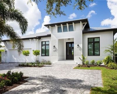 1257 11th Ct N. Experience elevated Naples living in this brand-new contemporary masterpiece located in the desirable Lake Park neighborhoodjust minutes from the pristine white-sand beaches, 5th Avenues fine dining and boutiques, and the best of downtown Naples. The residence offers four spacious bedrooms, each with a private ensuite, plus a dedicated office and convenient pool bathroom. The op...