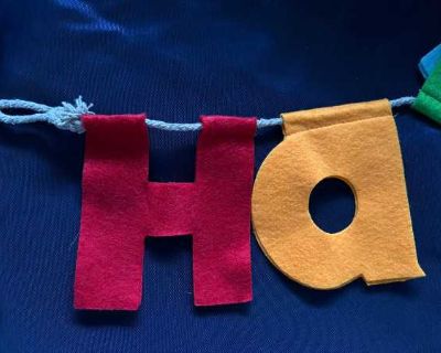 "Happy Birthday" banner made of felt fabric letters strung on a rope. Approx 5-foot length. Please let me know date and time you can pick up.