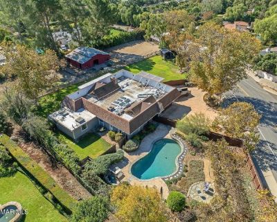 11316 Barranca Rd. Rare Horse Property rental in beautiful Santa Rosa Valley! From the moment you walk in through the charming dutch door, you'll feel right at home. Gorgeous pine plank flooring throughout entire home gives this home a rustic and cozy feel. Stunning entertainers's kitchen with huge center island. Living room with soaring wood beamed ceilings and fireplace opens to dining room s...