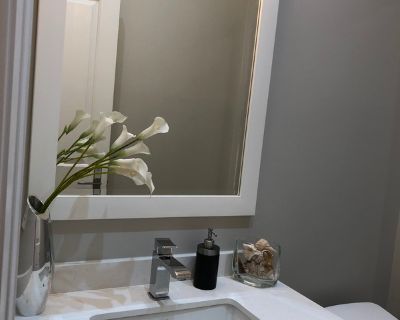 Furnished suite at convenient Yonge & Sheppard within new house in safe neighbourhood. Walk to Sheppard subway/metro station.Clean modern suite, includes your own bedroom with queen sized bed, beautiful private bathroom with marble finishes, living area with large comfy couch, coffee table and movable desk with chair.High 9 ceilings. Plus mini fridge, microwave and large sink in mini kitchenett...