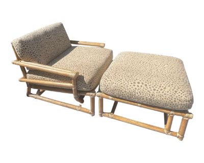 Gorgeous and rare! This vintage rattan lounge set by luxury brand McGuire of San Francisco is both seldom for sale and sought after by collectors. This set that includes an extra deep and wide lounge chair and matching ottoman, both in excellent condition. Featuring the expert craftsmanship McGuire is known for with a light brown rattan frame and complementary light colored leather bindings. Th...