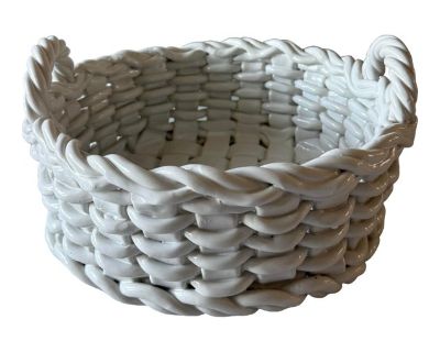 Large vintage Italian glazed ceramic woven basket with handles. Wonderful as a centerpiece for flowers or to hold fruit on the kitchen counter. Marked on the bottom.. Dimensions 11 W 11 D 6 H Styles Italian Mediterranean Period Mid 20th Century Country of Origin Italy Item Type Vintage, Antique or Pre-owned Shop Sustainably with Chairish Materials Ceramic Condition Good Condition, Original Cond...