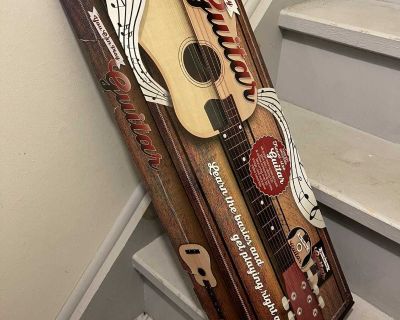 Kids guitar with disc and booklet