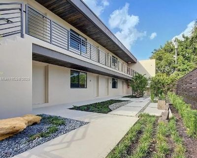 NE 38th St. Completely renovated Zen Garden corner apartment, luxury rental featuring 1 bedroom, 1 bath, 1st floor unit, pet friendly, secure and gated building. Only 8 units in total. Newer SS appliances, 2 mini split AC unit, Washer/Dryer combo in the apartment, quartz counter top, Laminate surface flooring, hurricane impact windows, beautiful landscaped property... 1 Bedroom. 1 Bathroom. 700 ft