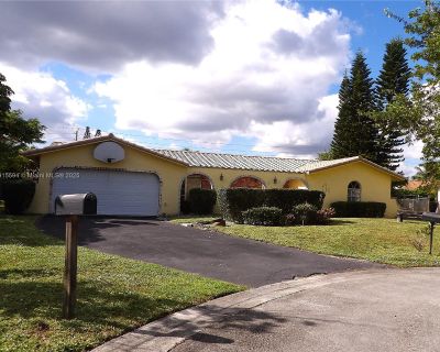 4 Bedroom 2BA 2340 ft Single Family House For Sale in Coral Springs, FL