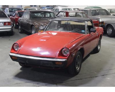 Odometer: 57022. A 1973 Jensen Healey MKI Roadster. Currently red with a black interior but the original color is yellow. 57,000 miles. A very nice and straight body. An extremely solid undercarriage as you can see in the pictures. The original interior is in overall good condition, except for the driver s seat and carpets which has some cracks. The soft top is there but the rear window is fogg...