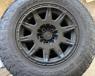 4 DX4 wheels with Toyo Open Country P215/75R15 tires