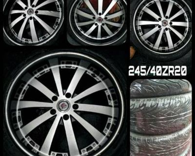Four used 5 Lug 20inch Rims in EXCELLENT CONDITION with 3 tires!!!