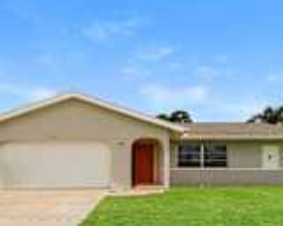 3 Bedroom 2BA 1496 ft² Pet-Friendly House For Rent in Cape Coral, FL 909 SE 35th St