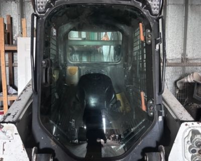 2019 Bobcat S570 skid loader with just under 2400 hours. Enclosed cab with heat/AC, steel system, good tires, block heater, quick attach, backup camera, and hand/foot controls. Stored inside for as long as we owned it. Used to feed hay and small property projects.