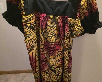 Hawaiian muumuu dress with a square neckline, puffed sleeves. Stylish fashion col