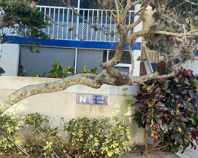 SE Royal Green Cir. Welcome to the Midport 1 2nd floor Condo unit, a charming 1-bedroom, 1-bathroom. Freshly painted with blue white gray color scheme. This end unit offers a unique blend of comfort and convenience, featuring a screened balcony. The unit comes with a stacked washer/dryer, refrigerator, stove, and dishwasher, ensuring all your essential needs are met. As a resident, you'll also ...