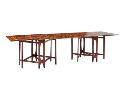 Bendt Winge Mid Century Norwegian Rosewood Drop-Leaf Rosewood Dining Table - Pair Each table measures: 8.25 wide x 34.75 deep x 28.75 inches high, with a chair clearance of 28 inches, the width with both drop leaves engaged is 59 inches Restored - Mint Condition! Ready to Ship. ABOUT PHOTOS: We take our photos in a controlled lighting studio to show as much detail as possible. We do not Photosh...