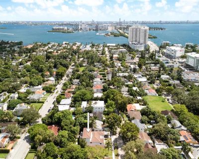 871 NE 81st St. Property for Rent in Miami, FL for $15,000 with 4 bedrooms and 3 full baths. This 3,486 square foot property was built in 1948.. Fully renovated designer home in Miami s Shorecrest. This 4BR + private office, 2.5BA residence offers over 3,400 SF with an open-concept kitchen featuring custom cabinetry, premium appliances, and a large island flowing into bright living and dining a...