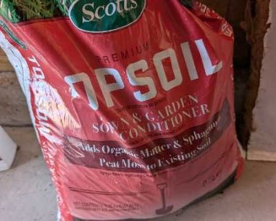Offer: Top soil, downspout splashblock, other garage misc.