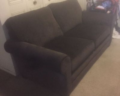 Brown velvet loveseat