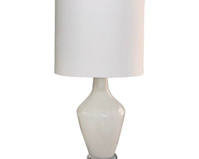 Rare large size neutral milky white blown glass lamp by Mottega. Mottega lamp bodies are traditionally crafted by artisans in Portugal, and assembled in the United States. The elegance they exude isn t possible to capture by photos. Shape and coloring uplifts contemporary or traditional decor wuth ease. Slightly fluted detail at neck. Adjustable finial height. Lucite finial. Lucite base. Qualit...