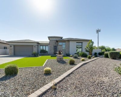 5760 S Huachuca Way. Resort style living at its finest in highly sought after gated community of Jacaranda Place! Gorgeous gourmet kitchen boasts massive center island w/breakfast bar, granite countertops, stainless steel appliances, huge hidden walk-in pantry, wine cooler and amazing retractable glass doors and windows that open to the private, cozy courtyard! The spacious master retreat featu...