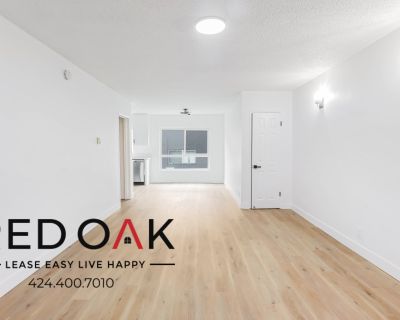 Marvelous Completely Remodeled Incredibly Spacious One Bedroom With Stainless Steel Appliances, TONS of Natural Light, Custom Built In&apos;s, On-Site Laundry, and PARKING Included in Prime Castle Heights!
