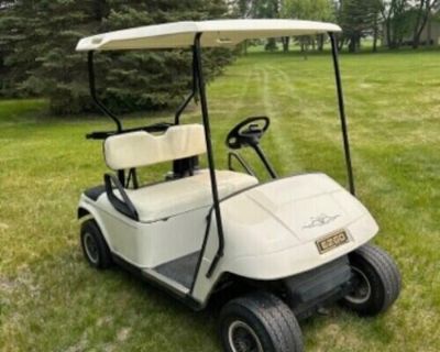 2011 EZ-Go TXT Golf Cart for sale. Gas with one year old battery. Used only abou